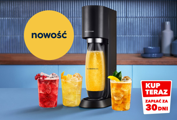 Na zdjęciu znajduje się urządzenie do napojów gazowanych z butelką wypełnioną żółtym napojem, obok której stoją trzy szklanki z kolorowymi napojami i lodem. Na grafice widnieje żółte koło z napisem nowość oraz czerwony prostokąt z napisem KUP TERAZ ZAPŁAĆ ZA 30 DNI.