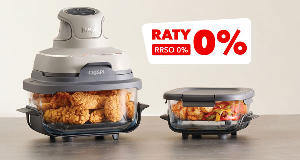 Na zdjęciu znajdują się dwa pojemniki kuchenne z przezroczystego szkła, wypełnione jedzeniem, z szarymi pokrywkami. Obok nich widnieje biało-czerwony napis RATY 0%, RRSO 0%.