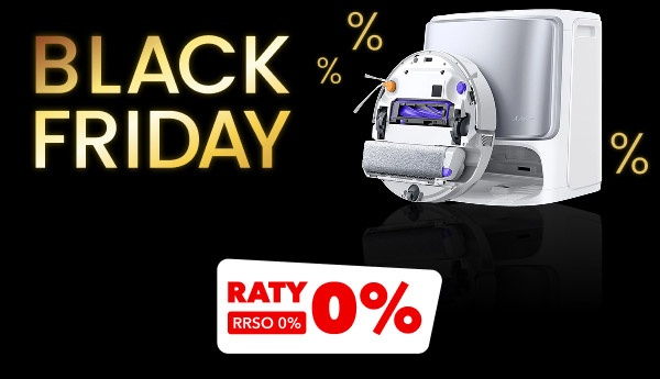 Na czarnym tle widnieje napis BLACK FRIDAY z symbolami procentów wokół, obok znajduje się biały odkurzacz automatyczny. Na dole umieszczono czerwony napis RATY 0% z dopiskiem RRSO 0% na białym tle.